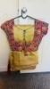 Picture of  trendy saree with multi use blouse
