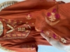 Picture of Never worn 3 piece suit in rust orange