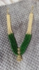 Picture of Gold sheeted Grand 4 lines greens and Swaroski pearls mala