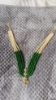 Picture of Gold sheeted Grand 4 lines greens and Swaroski pearls mala