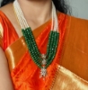 Picture of Gold sheeted Grand 4 lines greens and Swaroski pearls mala