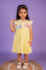 Picture of lemon yellow pearl frock 2-3y