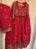 Picture of Red floral lehenga with cape