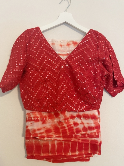 Picture of Never worn white/orange  tie-dye pattern saree with mirror work blouse