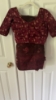 Picture of Elegant Deep Maroon Floral Organza Saree with Matching Blouse & Tassel Detail