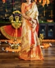 Picture of Exquisite Soft Gold & Champaine  Pink Brocade Pattu Silk Saree with Red border with Matching tissue Blouse