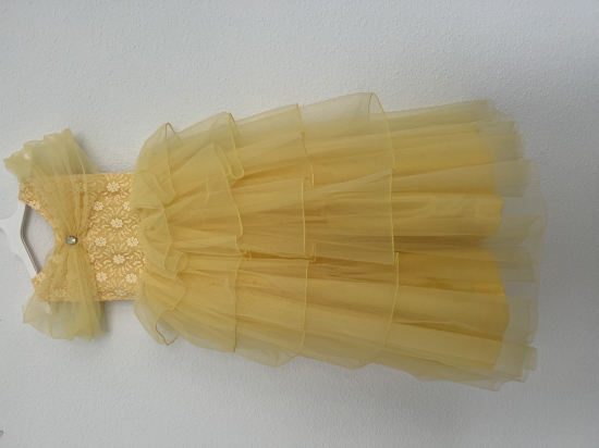 Picture of Never worn Yellow princess frock with shoulder detailing and layers on the bottom part
