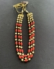 Picture of 3-line coral/gold color beads mala