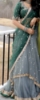 Picture of Green and grey fancy half saree 
