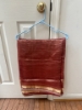 Picture of red space silk saree with contrast border